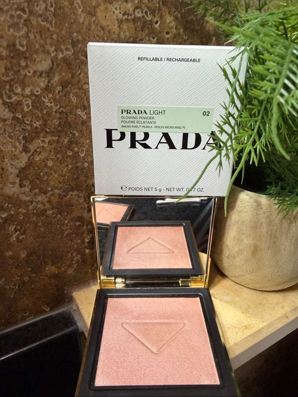 Prada Light Glowing Highlighter Powder 002 $90
